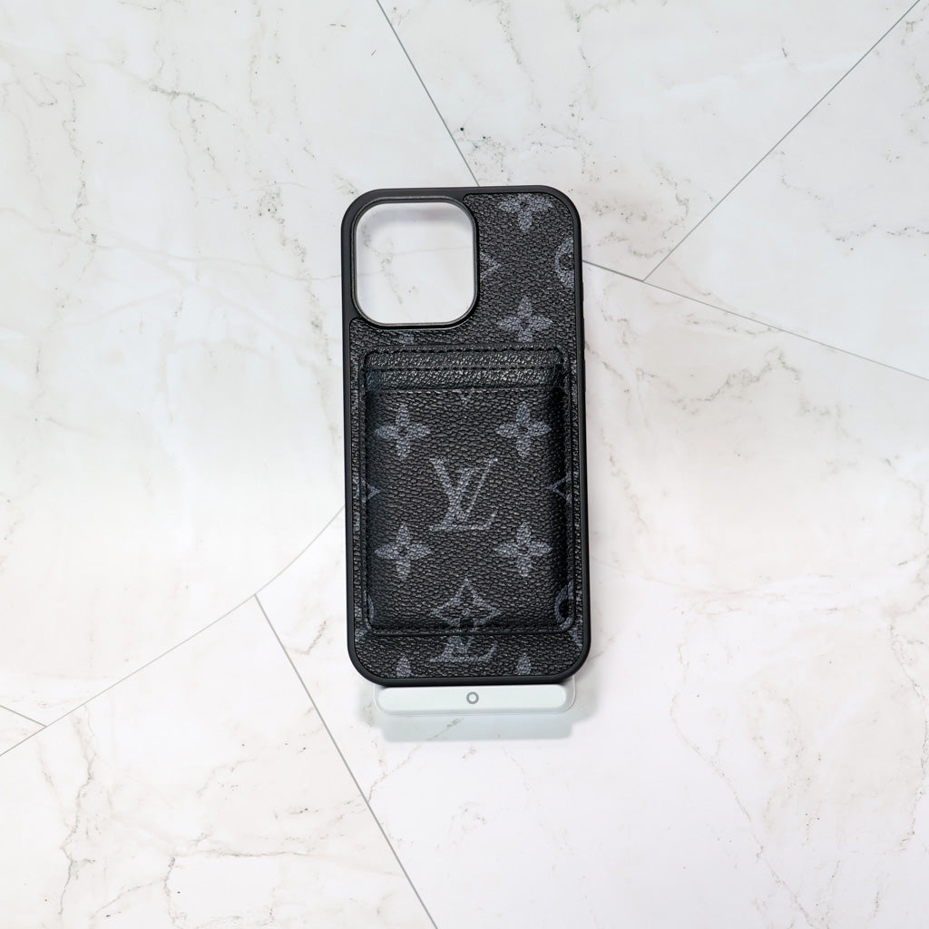 Close-up of the MagSafe card holder iPhone case showing the magnetic wallet connection