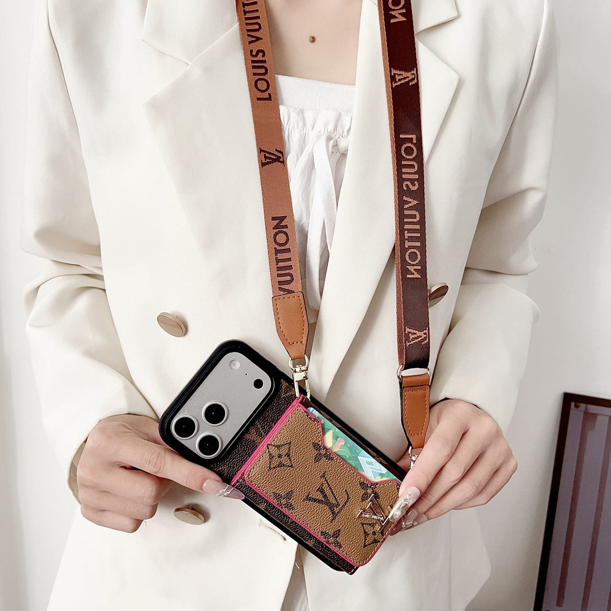 Multicolor monogram LV crossbody wallet iPhone case close-up showing card storage and leather texture