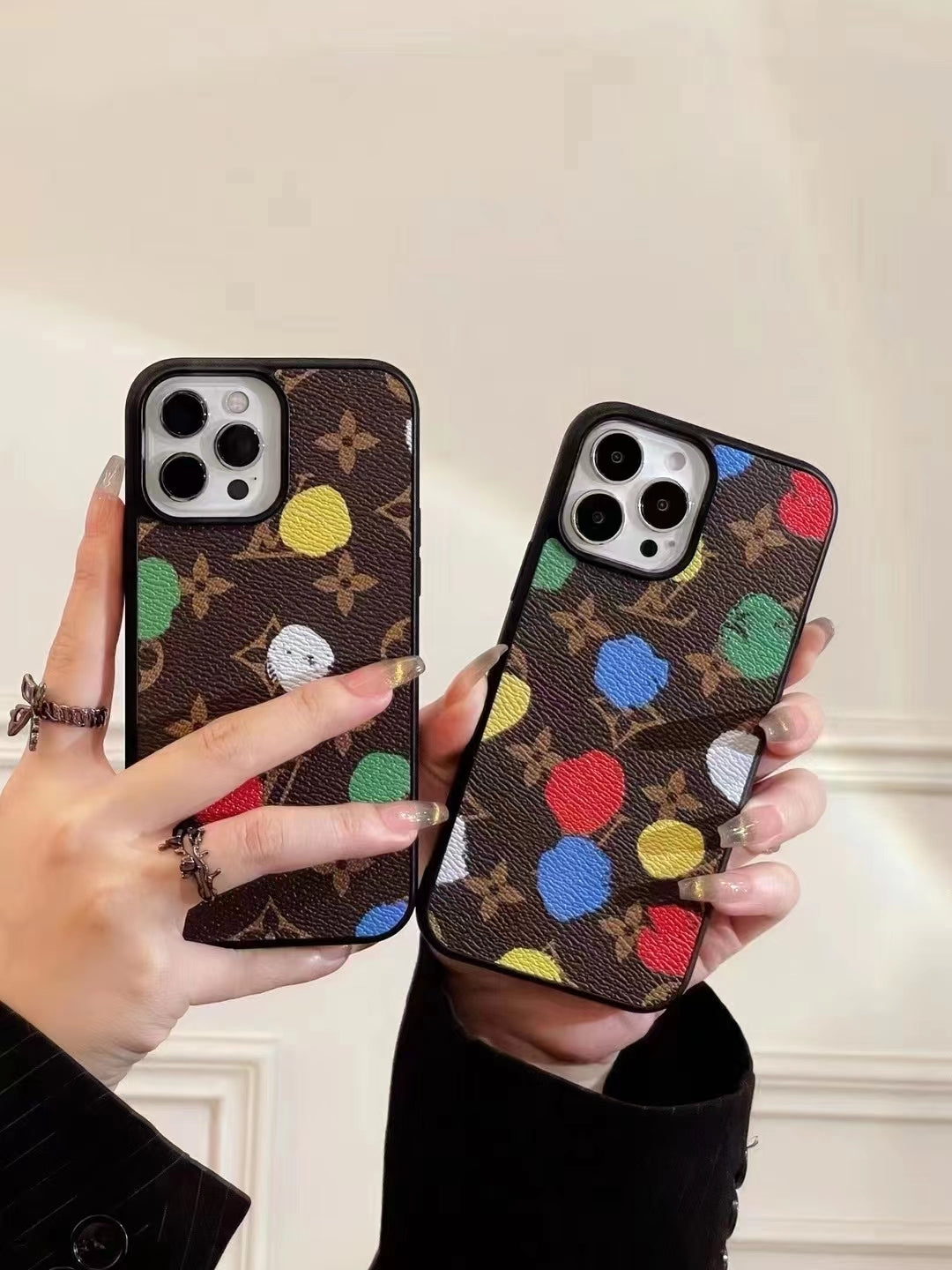 LV paint spots iPhone case shown in a composition view highlighting the artistic pattern