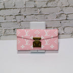 Pink monogram LV crossbody wallet iPhone case showing the rear wallet storage and slim fit