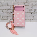 Pink monogram LV crossbody wallet iPhone case showing the strap, camera opening and protective edges