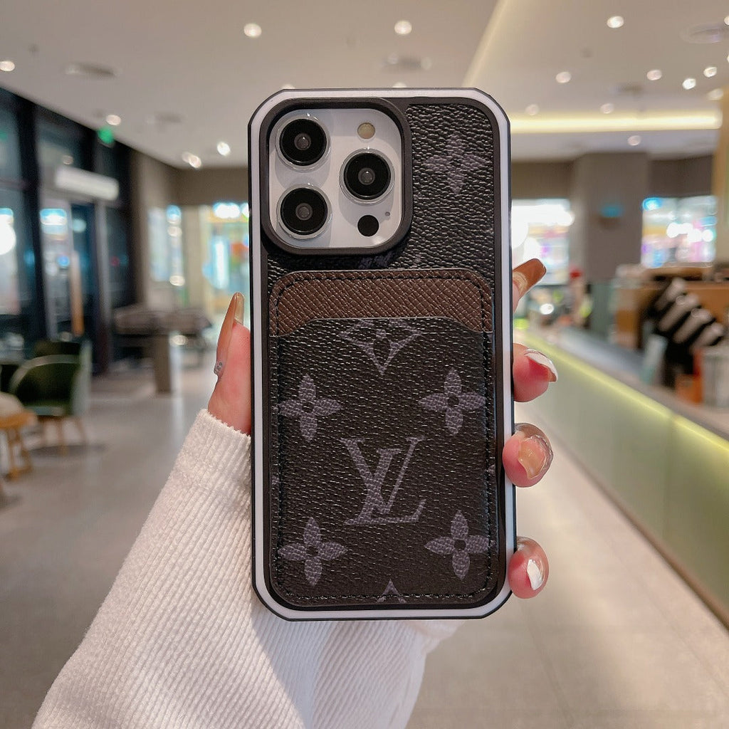 Close-up of the LV leather iPhone case showing the monogram pattern and fitted profile