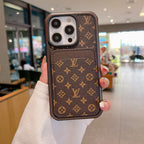 Close-up product view of the luxury LV monogram iPhone case and fitted edges