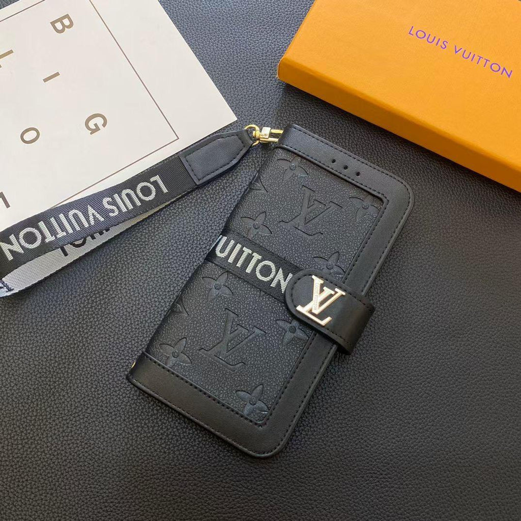 Black LV iPhone wallet case showing the dark leather folio design and card storage