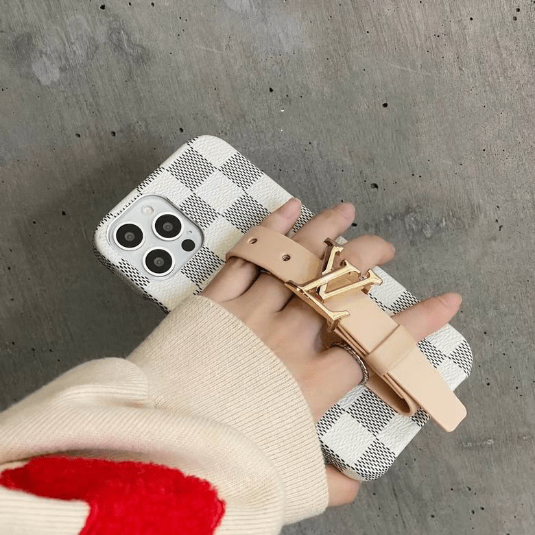 Designer hand strap iPhone case shown in a close-up view of the back cover and finish