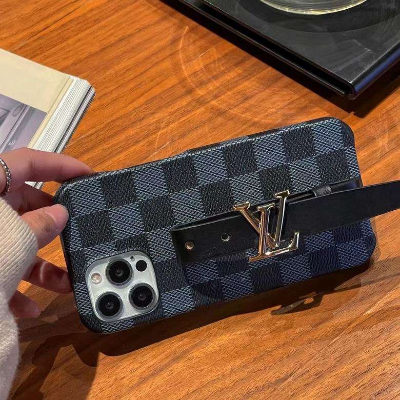 Detailed view of the iPhone case with hand strap showing material and edge finish