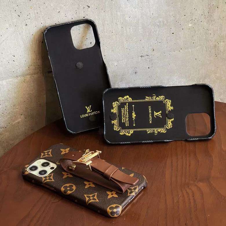 Close-up of the designer iPhone case showing the hand strap and patterned back finish