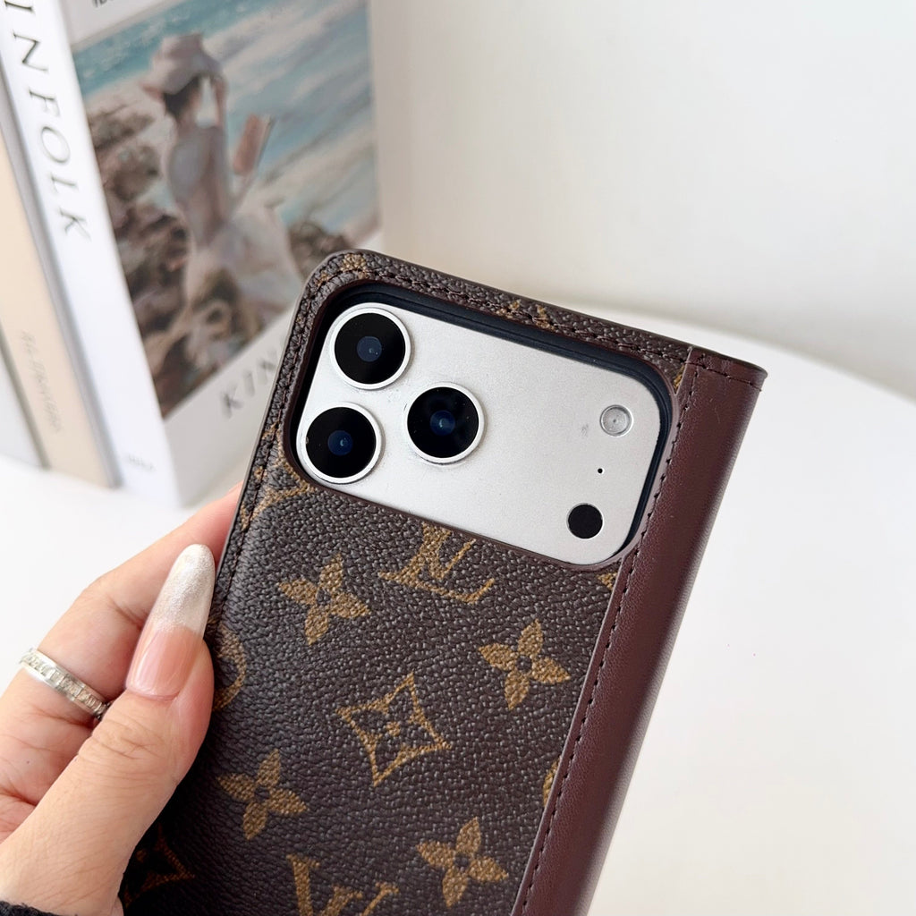 Louis V folio wallet iPhone case shown open with the protective phone shell