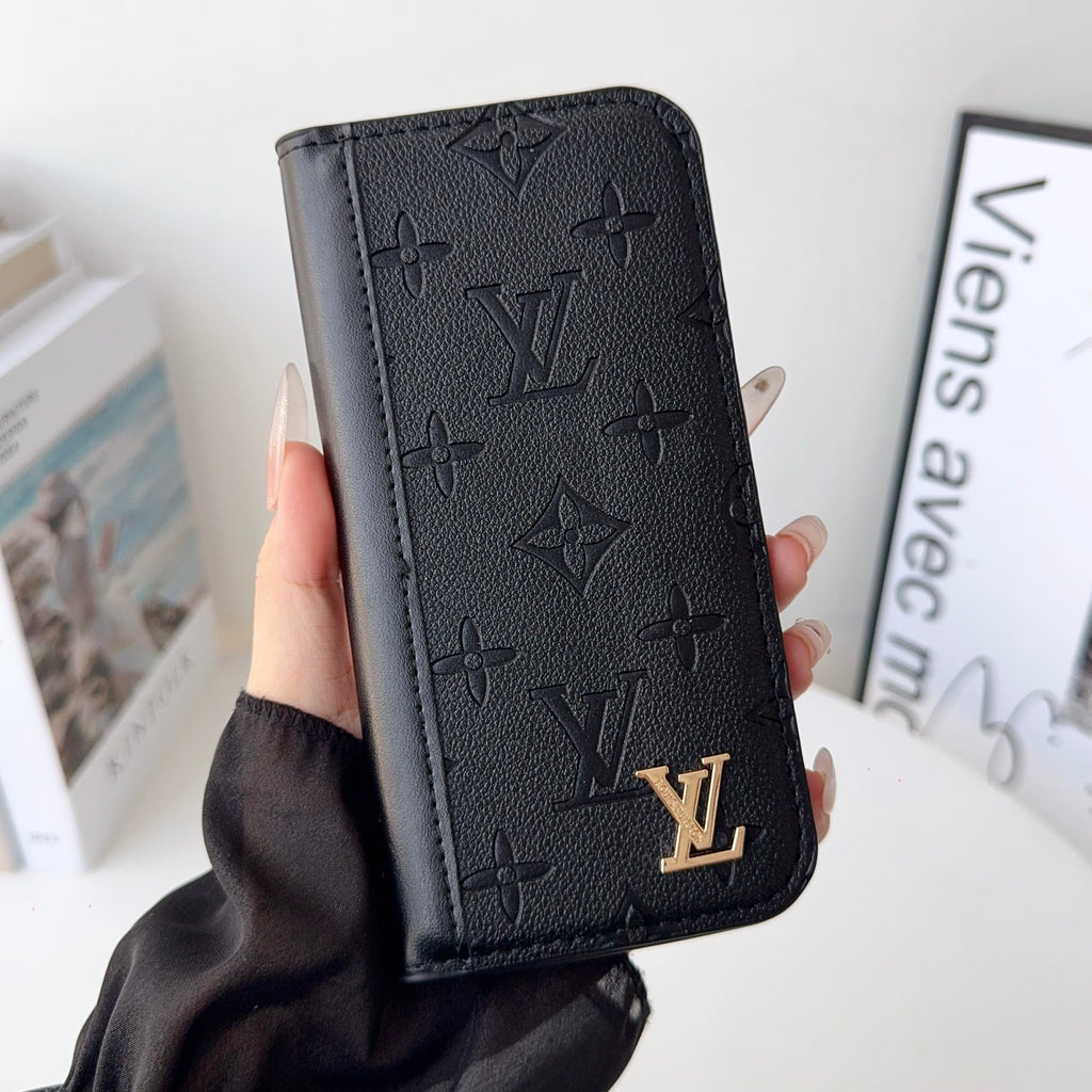Louis V folio wallet iPhone case close-up showing the folding cover and leather finish