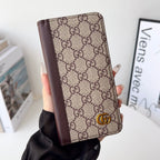 Louis V folio wallet iPhone case showing card storage, the rear cover and camera area