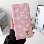 Louis V folio wallet iPhone case showing the fitted phone shell and slim folding profile
