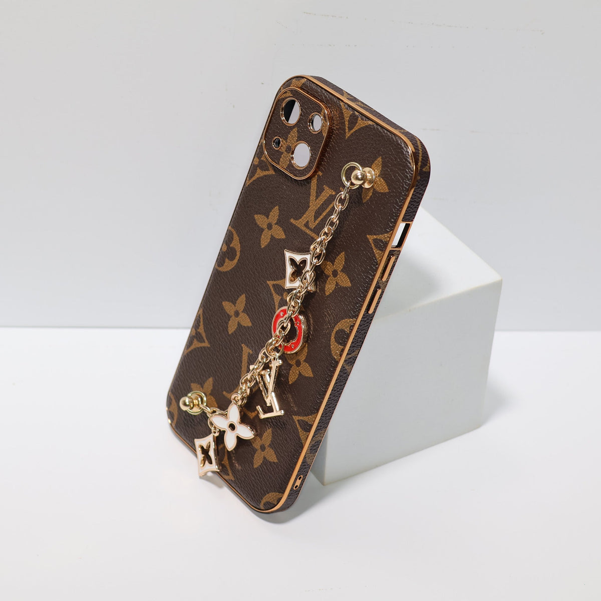 Luxury hand strap iPhone case showing the rear card holder and protective cover