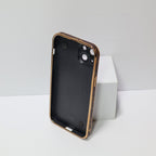 Luxury hand strap iPhone case showing the decorative strap and wallet-style back cover