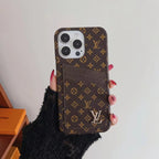 Brown small monogram LV iPhone card slot case showing the compact patterned finish