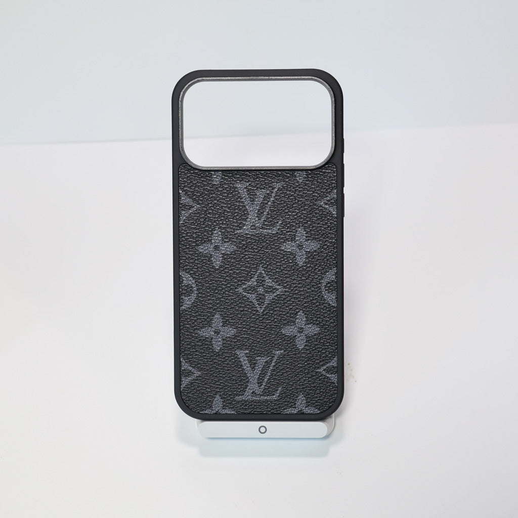 Classic leather LV iPhone case close-up highlighting the leather pattern and camera surround