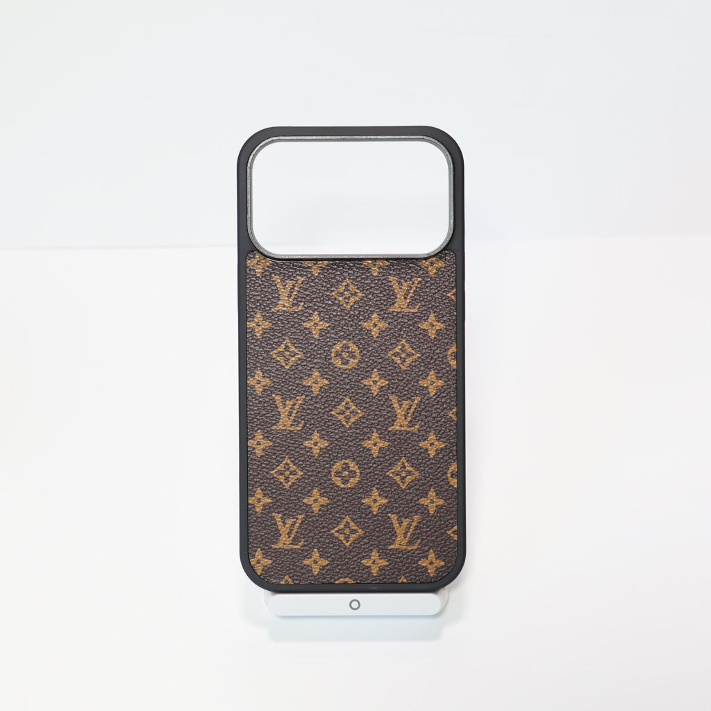 Classic leather LV iPhone case close-up showing the premium patterned surface and slim fit