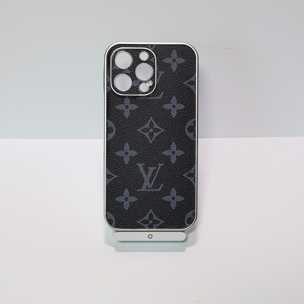 LV electroplated iPhone case shown from the back with protective corners and pattern