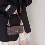 LV folio card holder iPhone case showing the slim wallet profile and patterned leather finish
