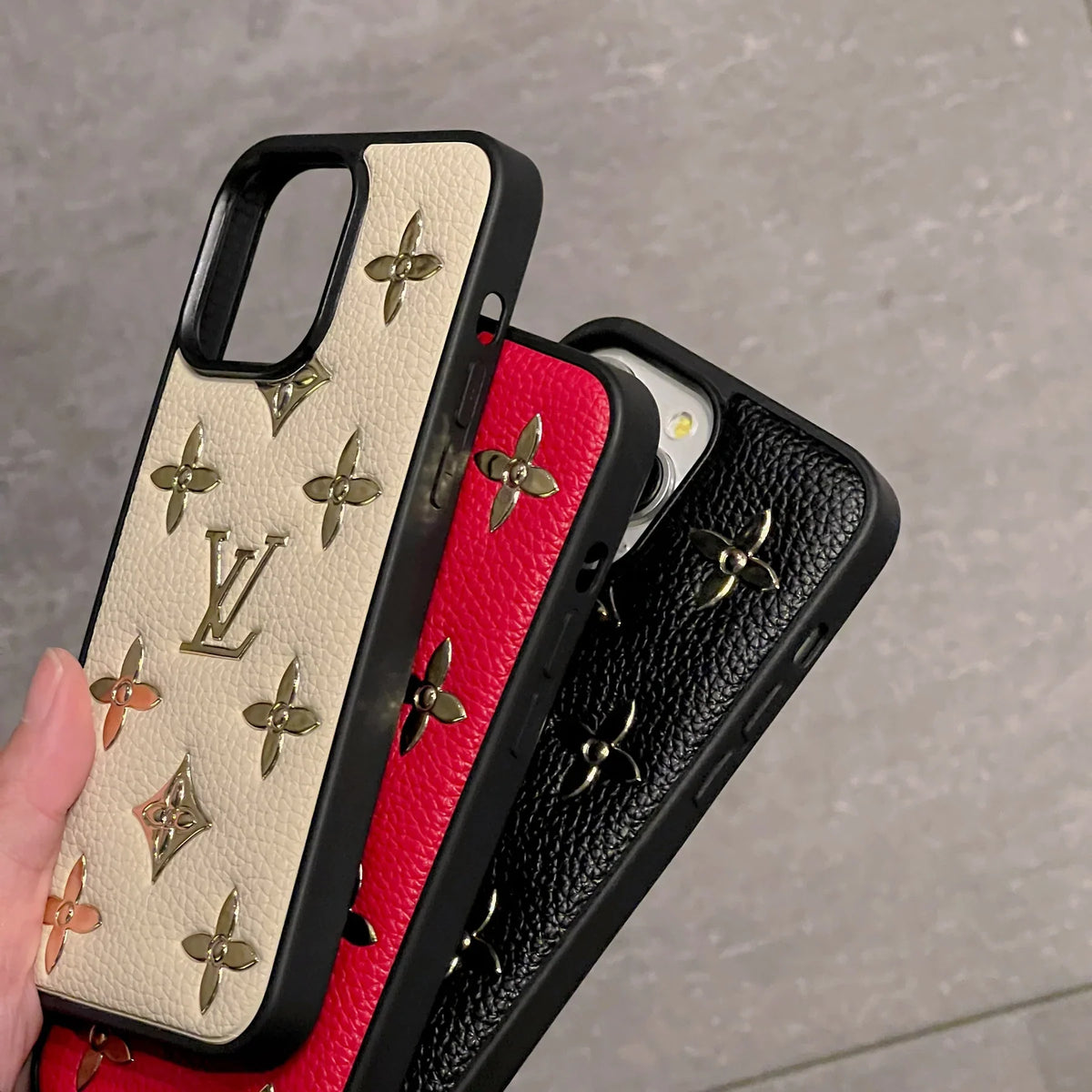 Luxury golden monogram iPhone case showing the fitted protective back and finished edges