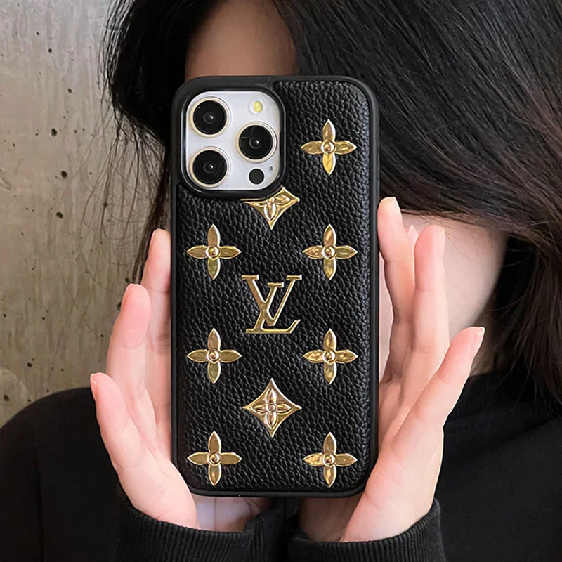 Luxury golden monogram leather iPhone case showing the gold-patterned back and camera opening