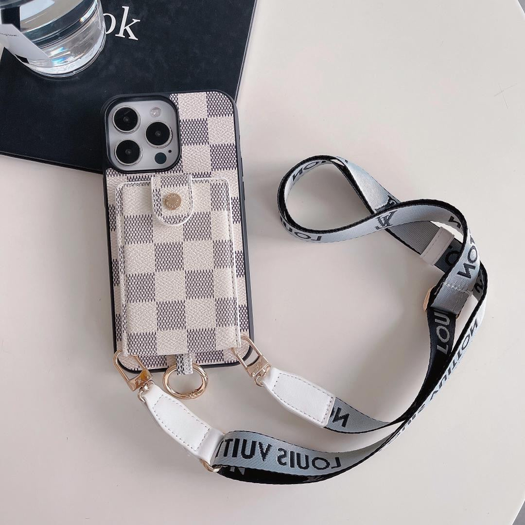 White checkered Louis Vuitton crossbody card holder iPhone case showing the light patterned finish