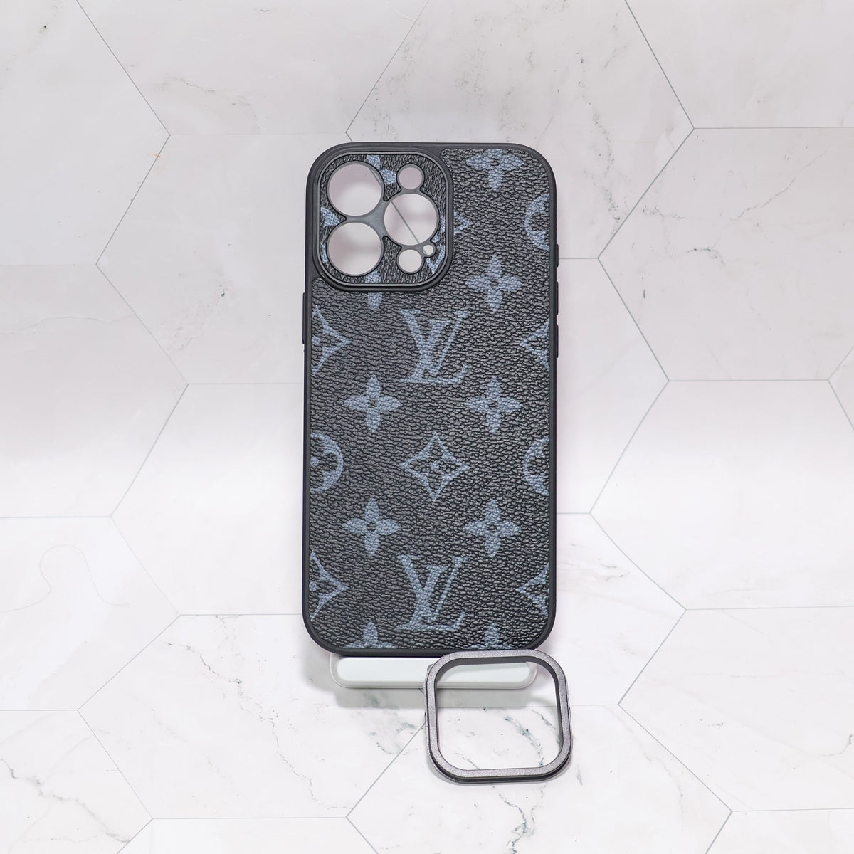 LV iPhone case with swappable camera lens frame showing the camera protection and slim fitted profile