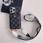 Black checkered Louis Vuitton crossbody card holder iPhone case showing the dark patterned rear cover