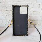 Designer trunk iPhone case showing the trunk-style back, camera opening and decorative hardware