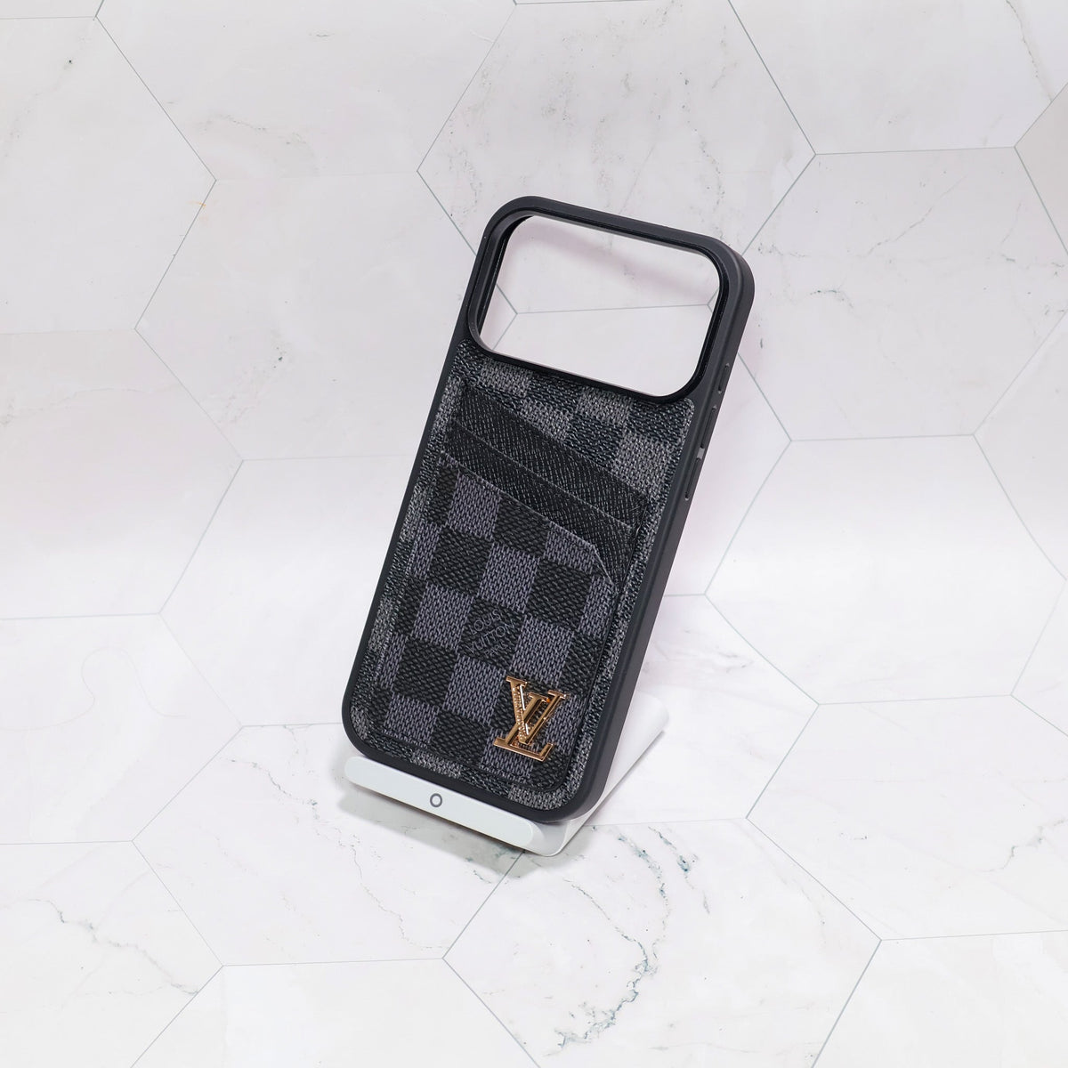 LV iPhone card holder case close-up showing the full wallet back and finished edges