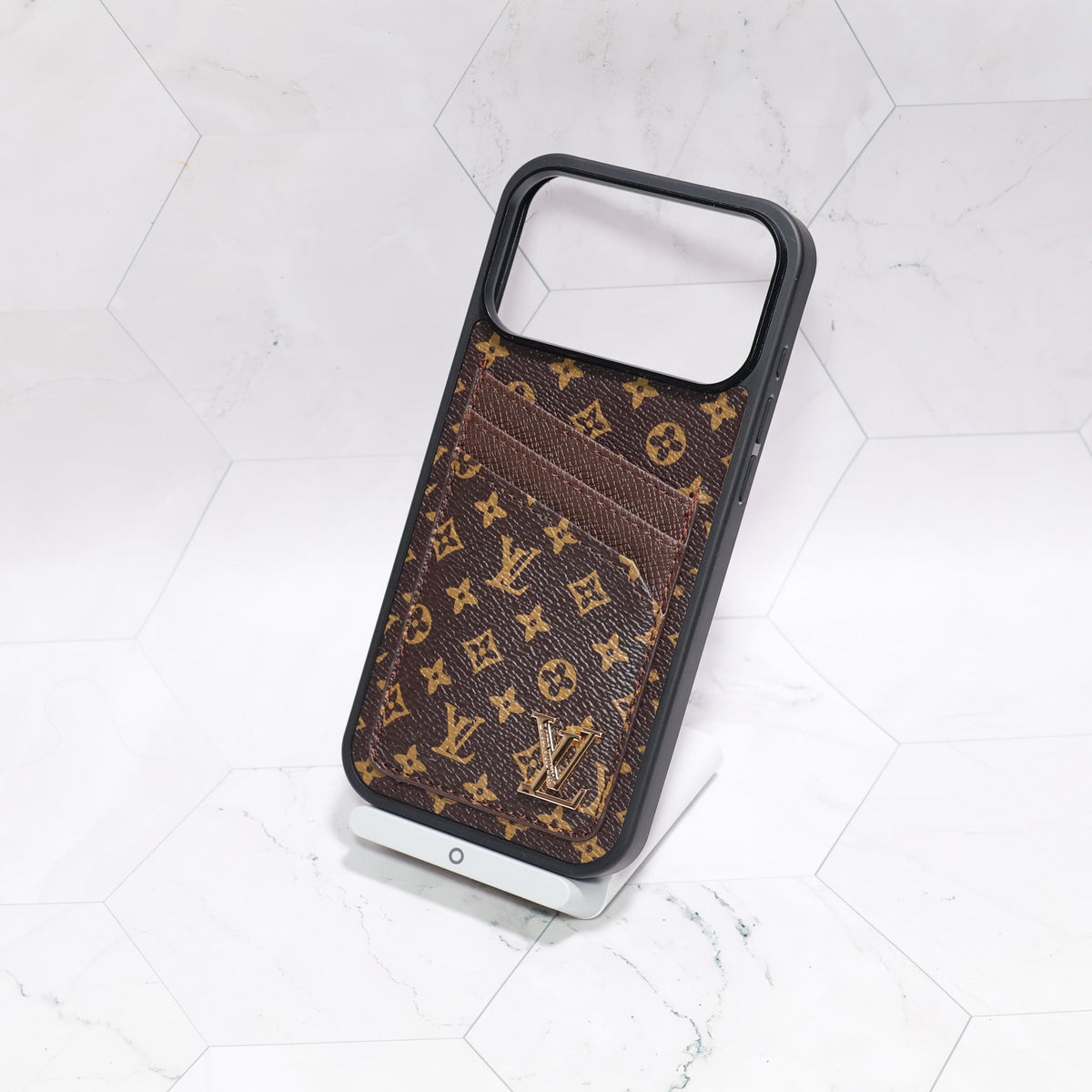 LV iPhone card holder case showing the integrated storage feature and patterned back