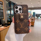 Brown monogram LV iPhone wallet case showing the patterned card holder cover