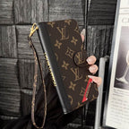 Brown monogram LV iPhone wallet case showing the classic patterned folding cover