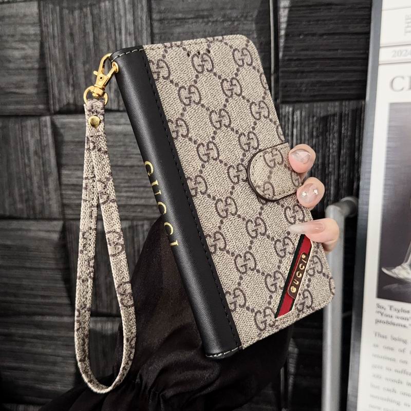 Beige GG diamond iPhone wallet case showing the patterned folio design