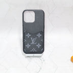 Detailed back view of the black monogram iPhone case showing texture and finished edges