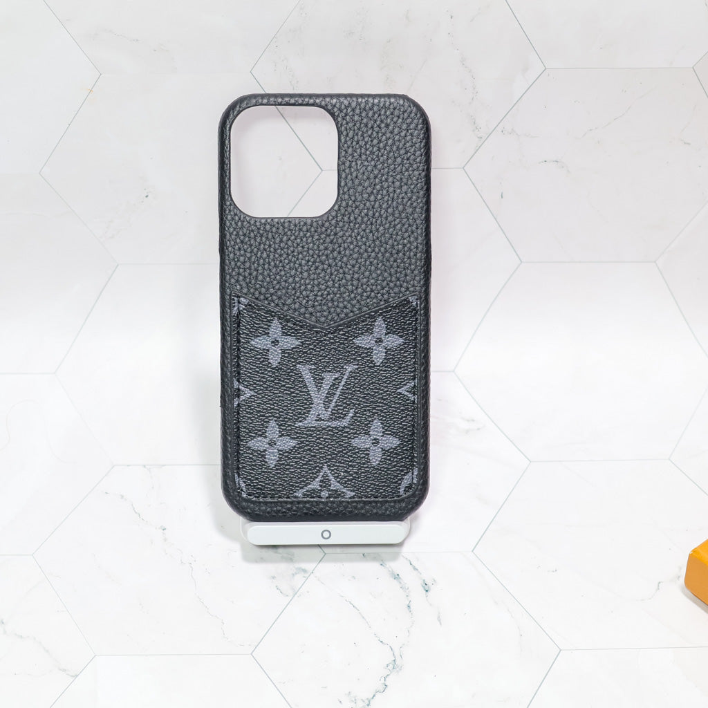 Detailed back view of the black monogram iPhone case showing texture and finished edges