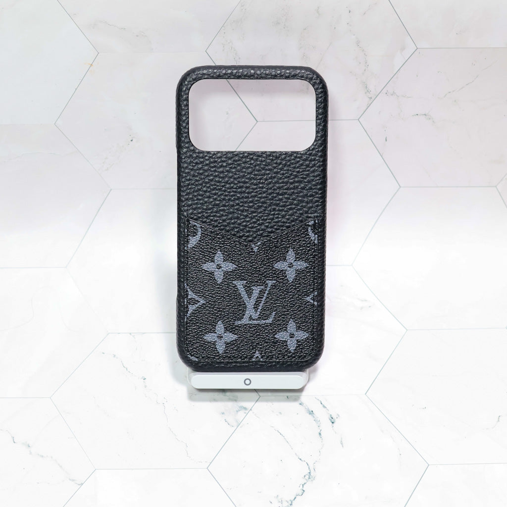 LV black monogram iPhone case showing the full patterned rear cover and slim fit