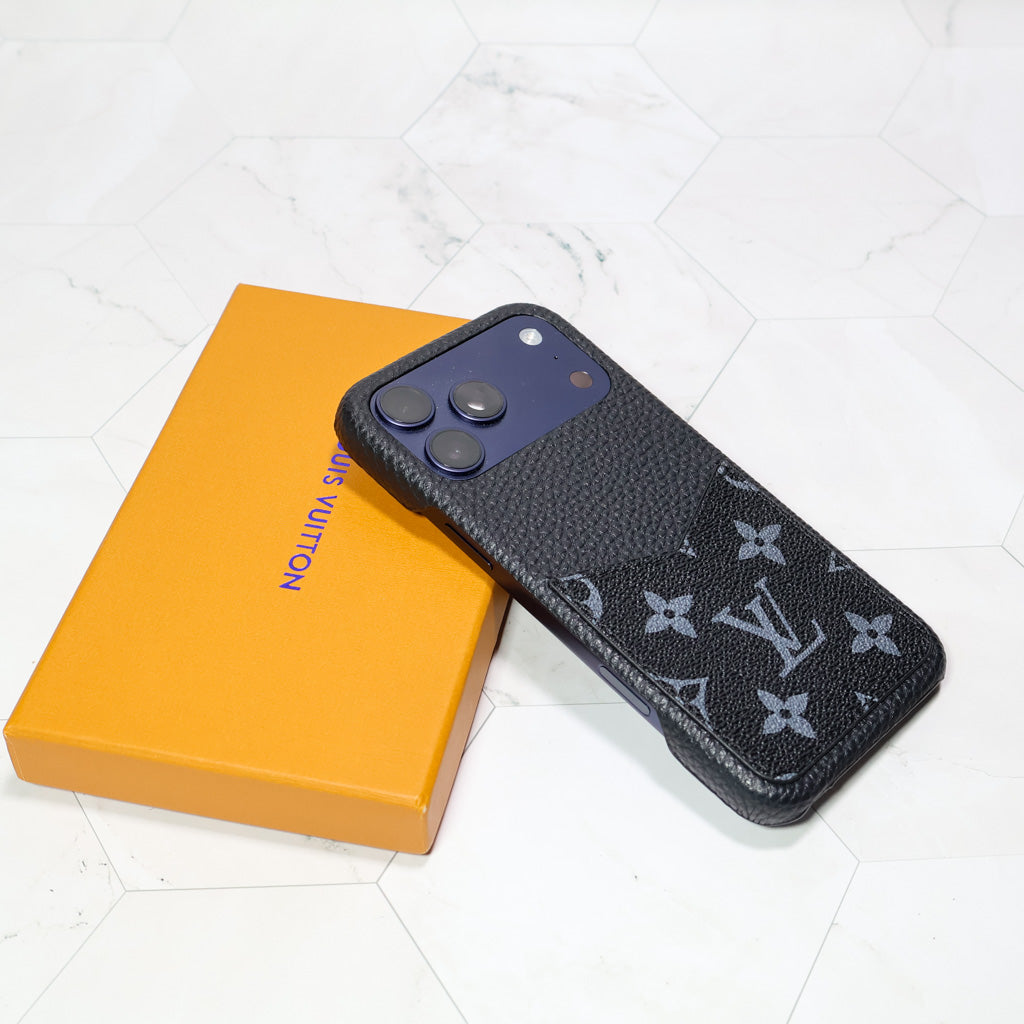 Black LV iPhone case showing the monogram back design and protective corners