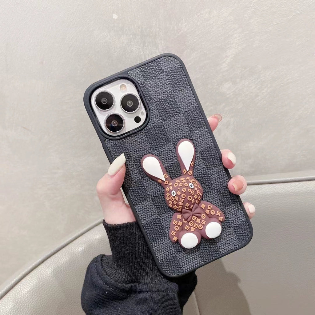 Black checkered 3D designer iPhone case front view showing the dark patterned protective cover