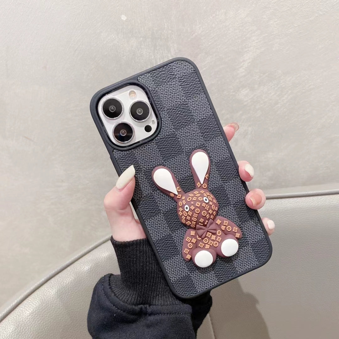 Black checkered 3D designer iPhone case front view showing the dark patterned protective cover