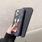Black checkered 3D designer iPhone case showing the textured patterned back