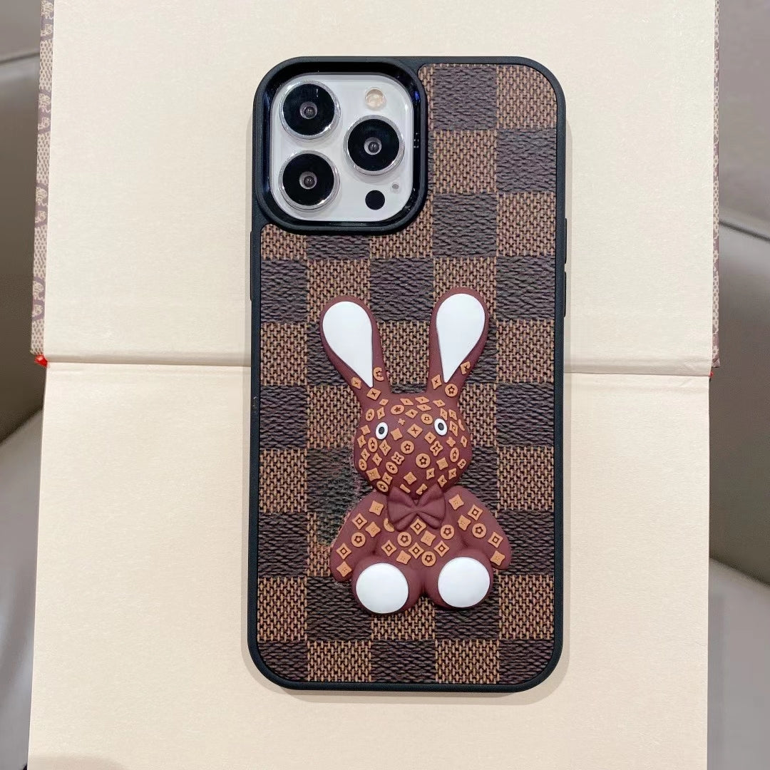 Brown checkered 3D designer iPhone case front view showing the textured protective design