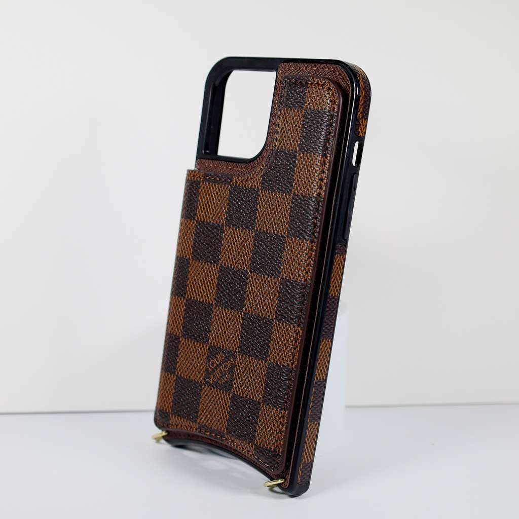 Checkered leather crossbody iPhone case showing the fitted camera opening and protective edges
