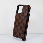 Checkered leather crossbody iPhone case showing the fitted camera opening and protective edges