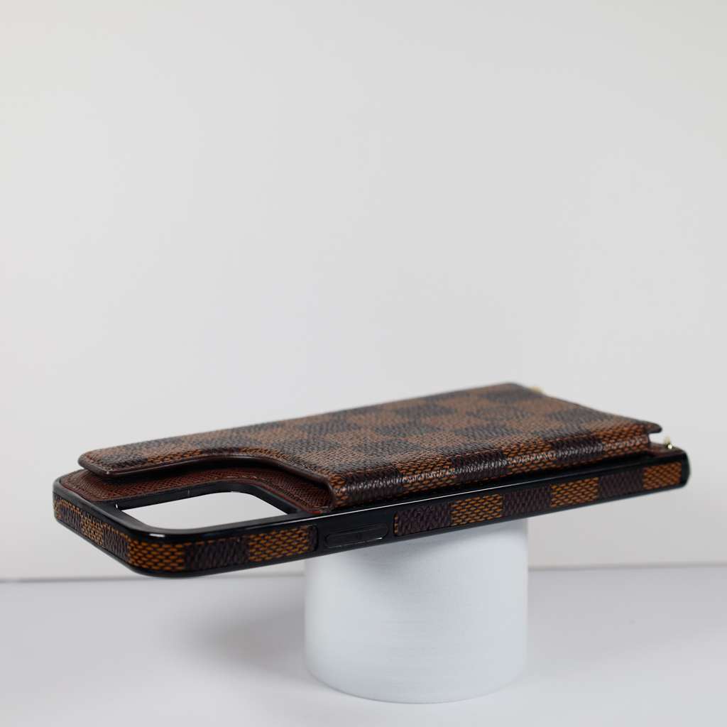 Checkered leather crossbody iPhone case showing the protective rear cover and camera area