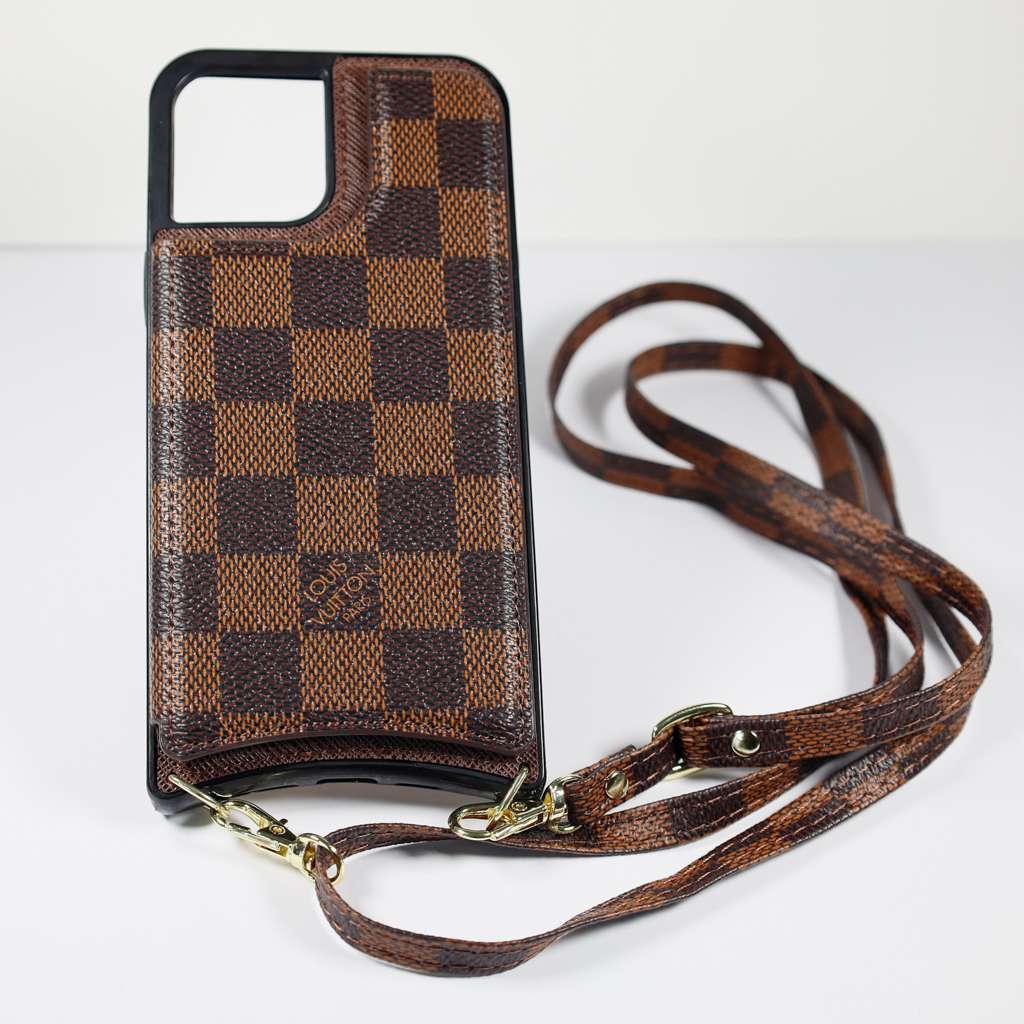 Checkered leather crossbody iPhone case showing the shoulder strap and patterned rear cover