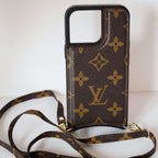 LV monogram leather iPhone case showing the slim profile and classic patterned back