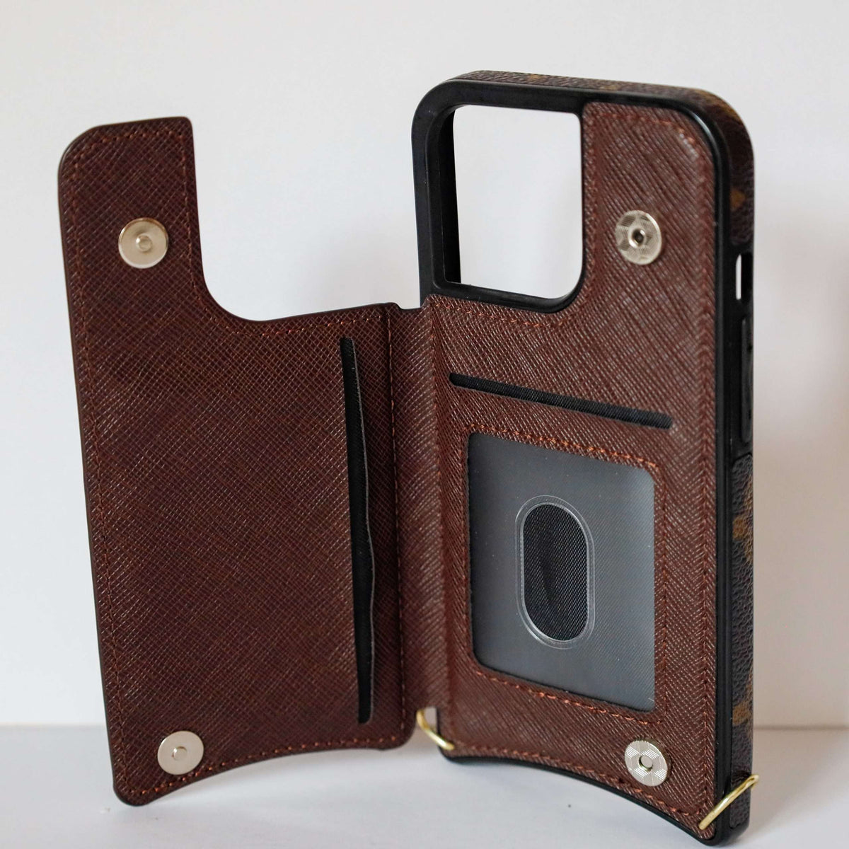 LV monogram leather iPhone case showing the full rear design and fitted camera opening