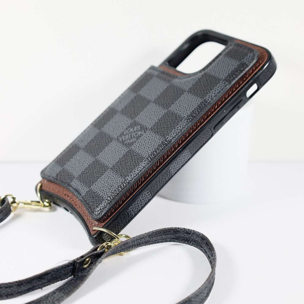 Black checkered leather iPhone wallet case close-up showing interior storage and leather finish