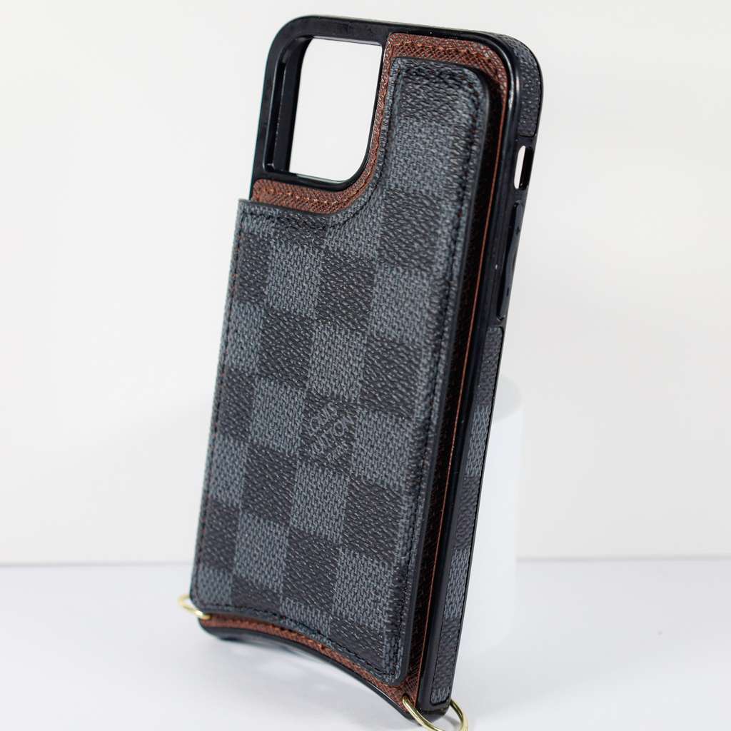 Black checkered leather iPhone wallet case showing the folding cover and card storage