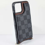 Black checkered leather iPhone wallet case close-up showing the patterned leather texture